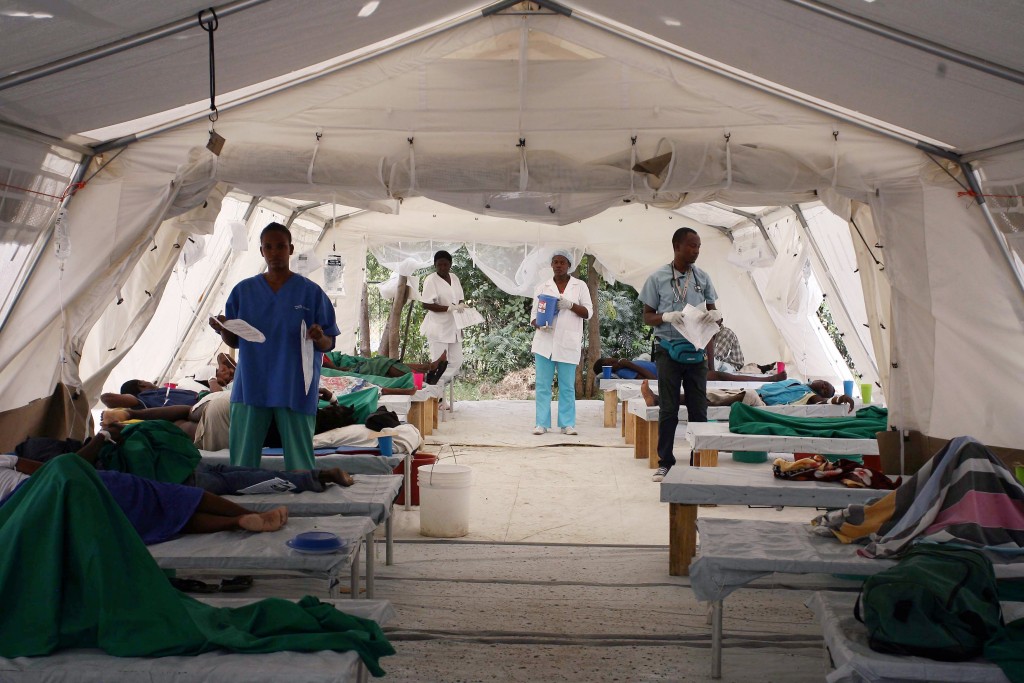 Medcial personnel tend to patients suffering from cholera at the Hospital Bicentenaire run by Doctors Without Borders in Port-au-Prince, Haiti, Dec. 10, 2010.